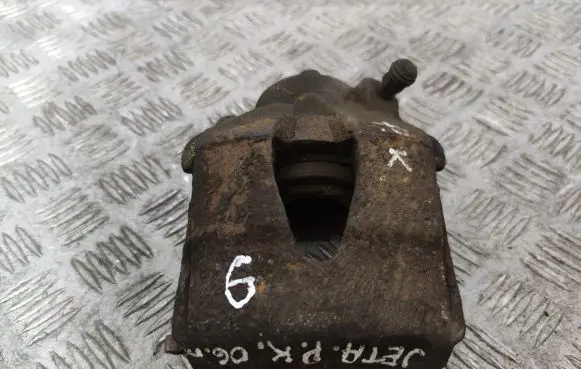 Volkswagen Jetta V Front brake caliper