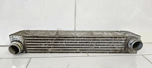 BMW 5 E60 E61 Intercooler radiator 7795823 F6438000