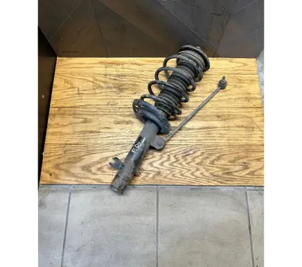 Front shock absorber with coil spring