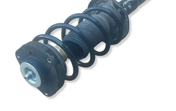 Volkswagen Golf VI Front shock absorber with coil spring 