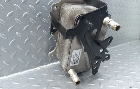 Oil filter mounting bracket
