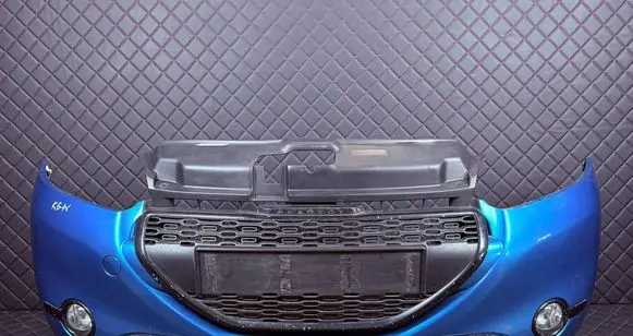 Peugeot 208 I Front bumper 