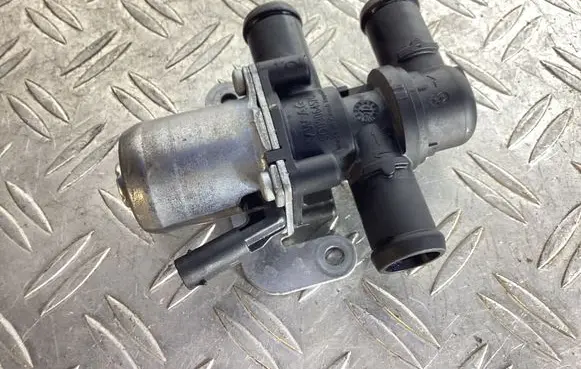 Coolant heater control valve