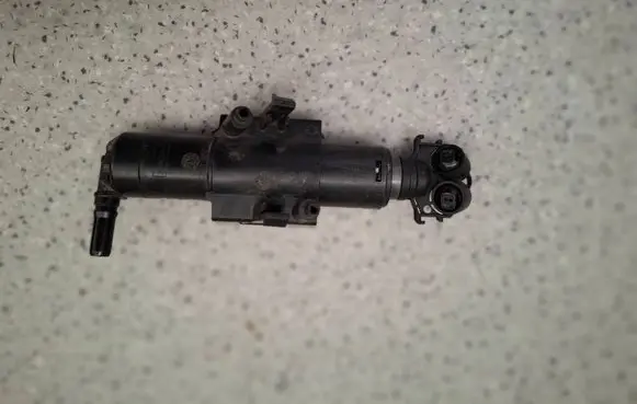 Ford Kuga II Headlight washer spray nozzle GV4113L014AE