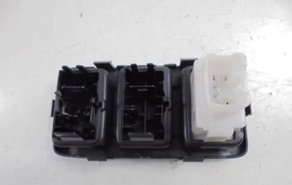 Suzuki Swift I Headlight level height control switch