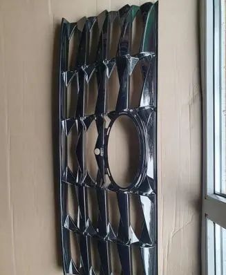 Hyundai Tucson IV NX4 Front bumper upper radiator grill