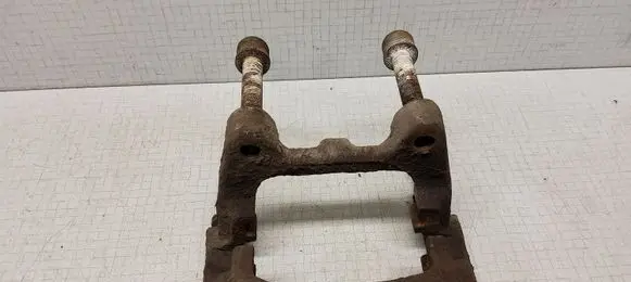 Volkswagen PASSAT B6 Brake caliper pad carrier rear 