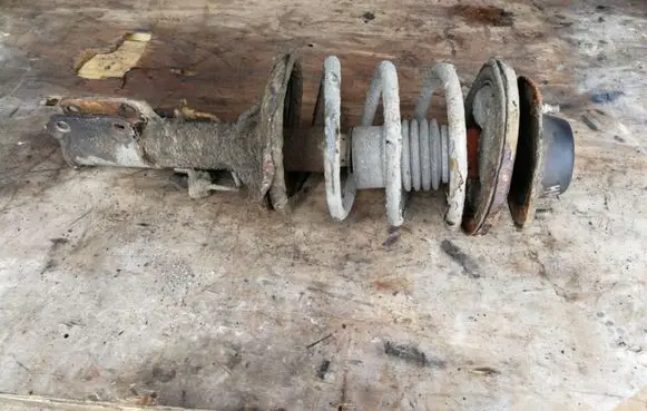 Mitsubishi Galant Front shock absorber with coil spring
