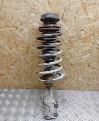 Volkswagen Caddy Front shock absorber with coil spring
