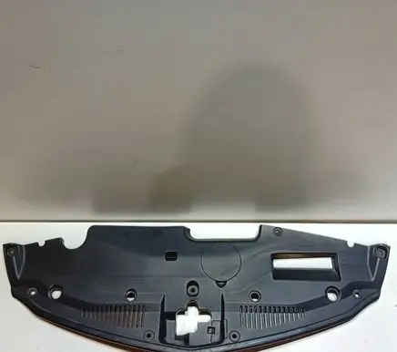 Engine bonnet/hood lock trim molding