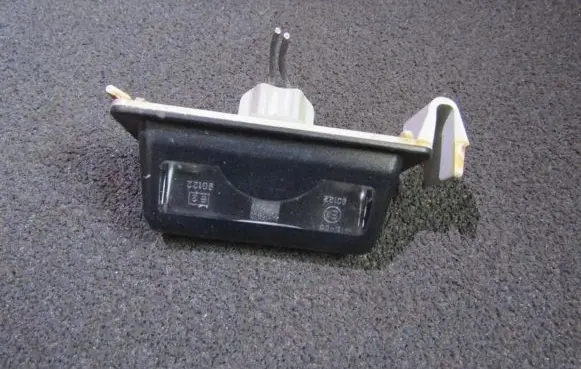 Mazda 323 Number plate light