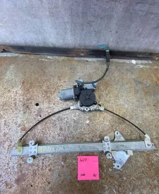 Nissan Primera Front door window regulator with motor 400601T2
