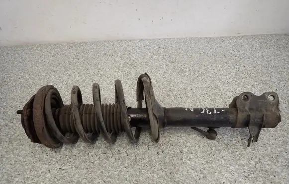 Nissan X-Trail T30 Front shock absorber with coil spring