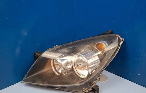 Opel Astra H Headlight/headlamp 24451032 1EG2703701
