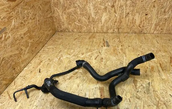 Volkswagen Golf VII Engine coolant pipe/hose 5Q0121049CL