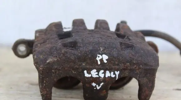 Subaru Legacy VII Front brake caliper
