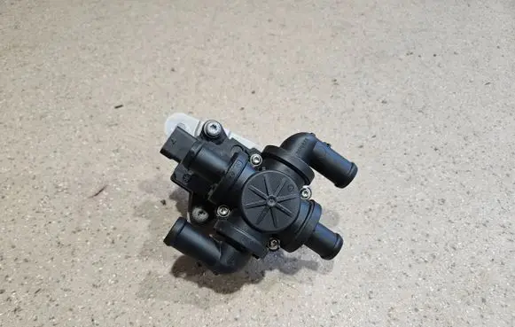 Coolant heater control valve