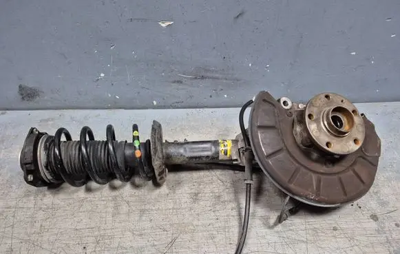 Volkswagen PASSAT B7 Front wheel hub spindle knuckle 