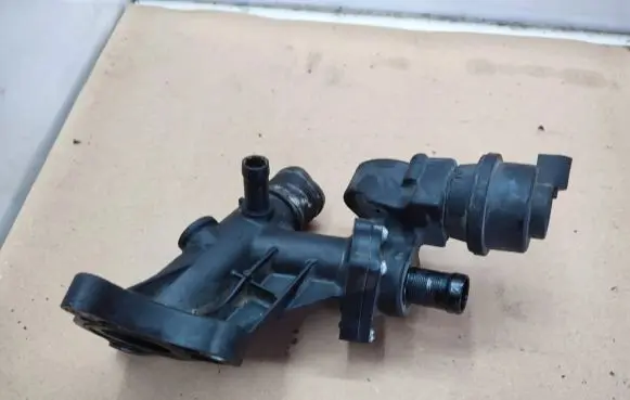 Thermostat/thermostat housing