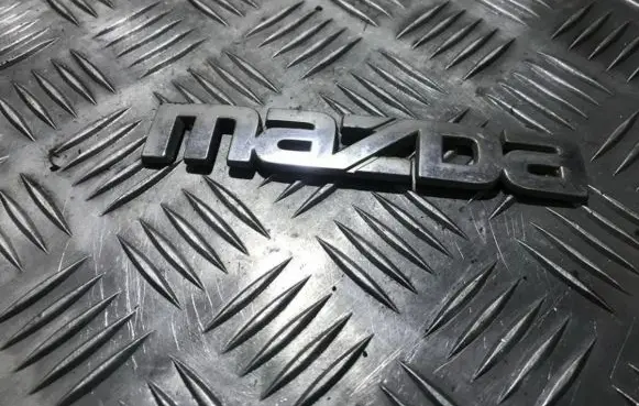Mazda 626 Manufacturer badge logo/emblem 