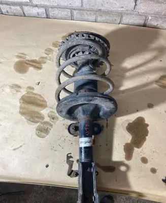 Chrysler Grand Voyager V Front shock absorber with coil spring AGY002M1 FCK46