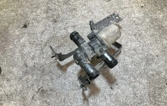 Coolant heater control valve
