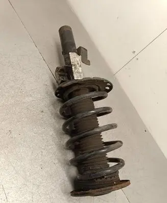 Front shock absorber with coil spring