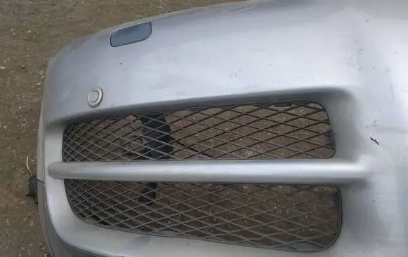 Volkswagen Touareg I Front bumper lower grill