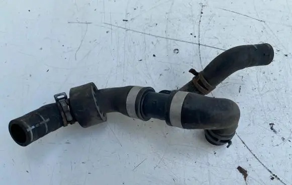 Volkswagen Golf VII Engine coolant pipe/hose 04L121087