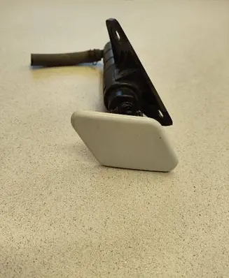 KIA Sportage Headlight washer spray nozzle 00066134