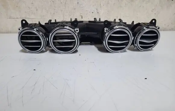 Dash center air vent grill
