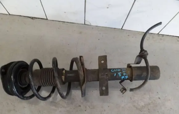 Renault Clio III Front shock absorber with coil spring