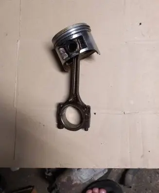 Piston with connecting rod