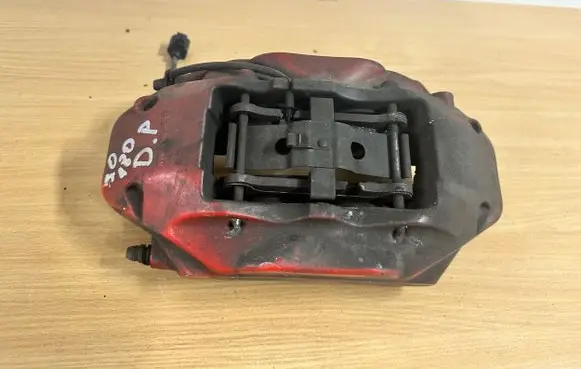 Volkswagen Touareg II Front brake caliper