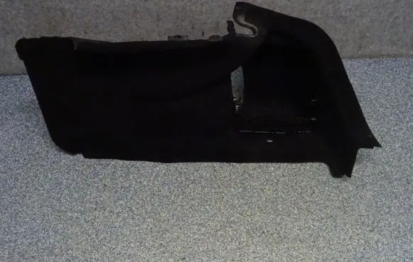Trunk/boot lower side trim panel