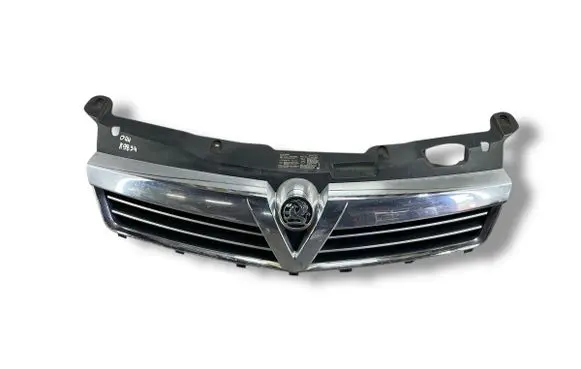 Opel Astra H Front bumper upper radiator grill 13225788 13225789