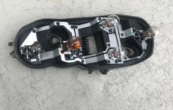 Opel Corsa D Tail light bulb cover holder 89037853