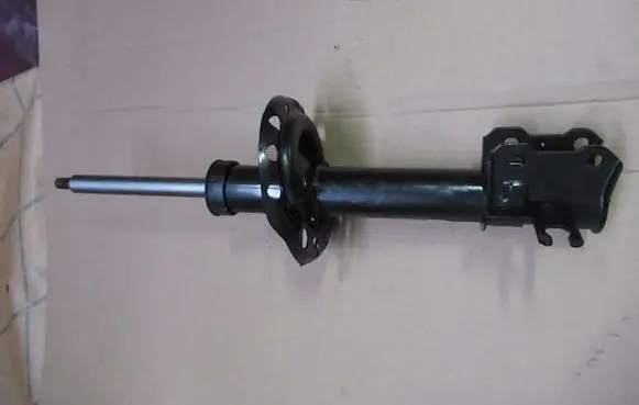 Opel Astra H Front shock absorber/damper 13280732