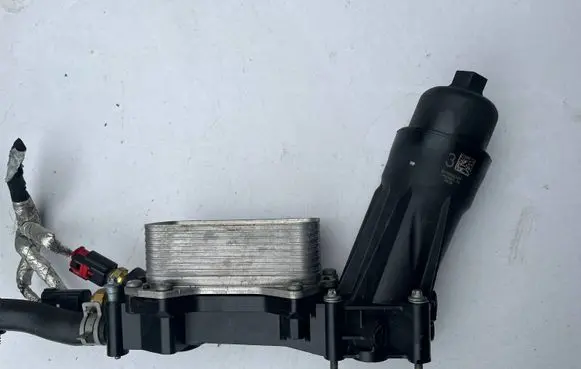 Jeep Cherokee Oil filter mounting bracket 67904244113 1E006649