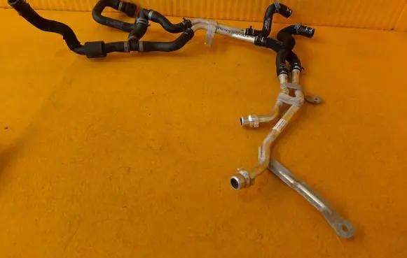 Volkswagen Touareg III Engine coolant pipe/hose 4M0121485CP 4M0819927C