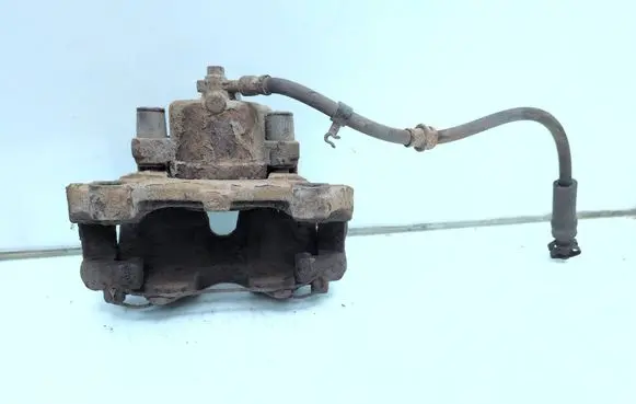 Opel Astra H Front brake caliper 