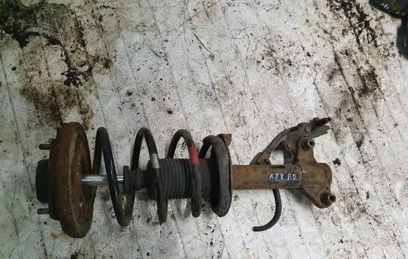 Nissan Primera Front shock absorber with coil spring NOCODE