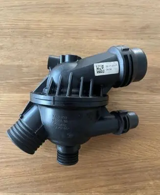 Thermostat/thermostat housing