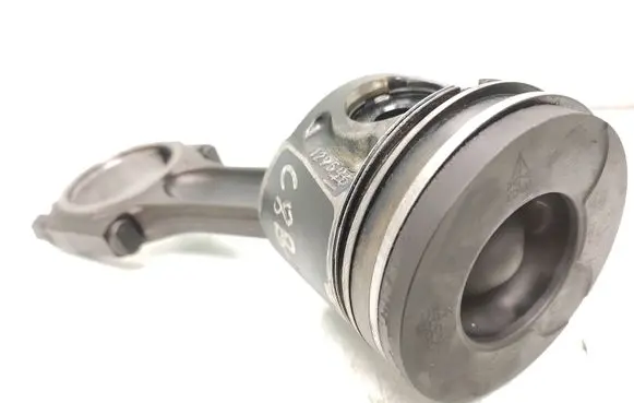 Piston with connecting rod