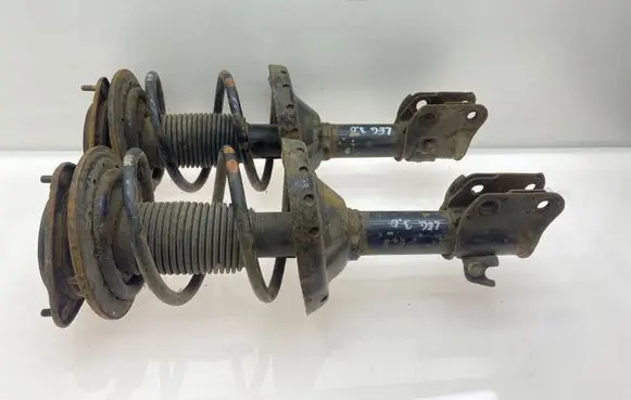 Subaru Legacy Front shock absorber with coil spring