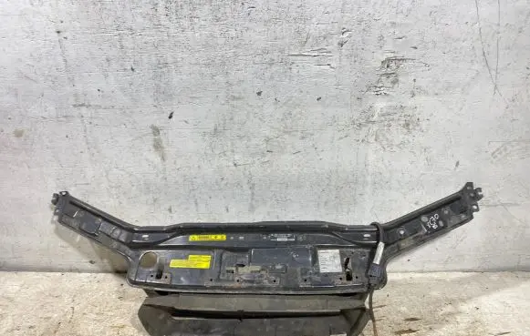 Top upper radiator support slam panel