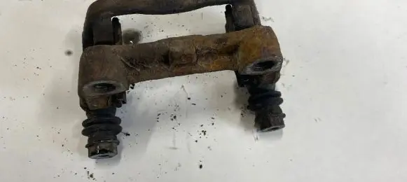 Opel Astra H Brake caliper pad carrier rear 