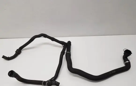 Volkswagen Golf VII Engine coolant pipe/hose 5Q0122051BJ 5Q0121619D