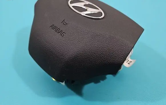 Steering wheel airbag