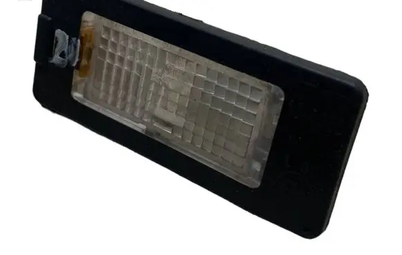 Volkswagen Golf VI Number plate light 15A385 E44602